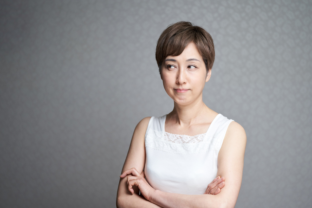 Middle-aged Japanese woman thinking about beauty